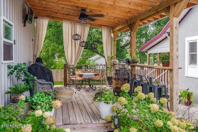 wooden terrace with ceiling fan