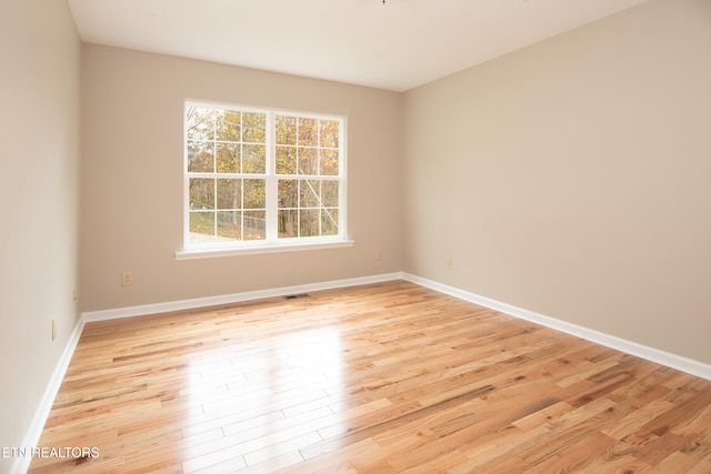 empty room featuring light hardwood / wood-style flooring