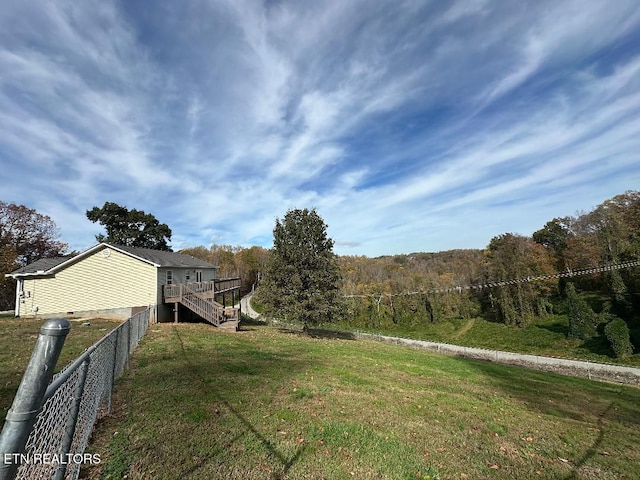 view of yard with a deck