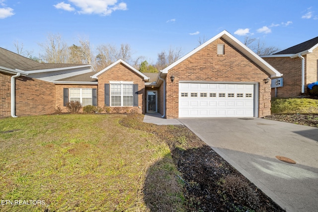 view of front facade with a garage and a front lawn