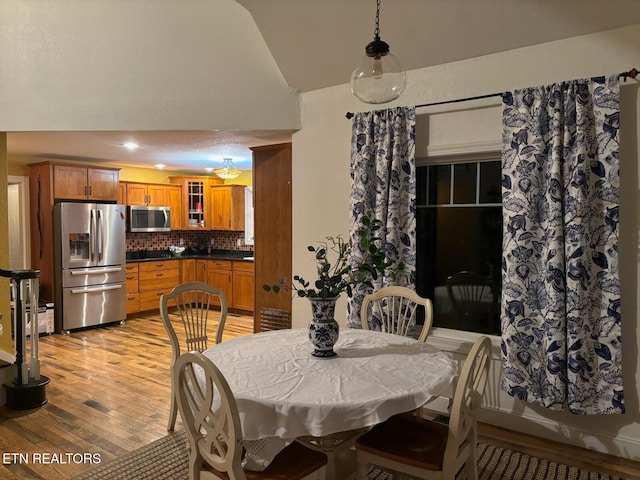 dining area with light hardwood / wood-style flooring