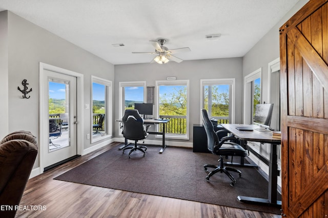 159 Garfield Ln, Sharps Chapel, TN 37866 - office space with a ceiling fan, wood finished floors, and baseboards