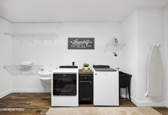 159 Garfield Ln, Sharps Chapel, TN 37866 - laundry room featuring washing machine and clothes dryer, wood finished floors, baseboards, and cabinet space