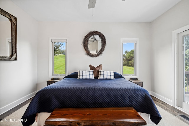 bedroom featuring ceiling fan and wood-type flooring