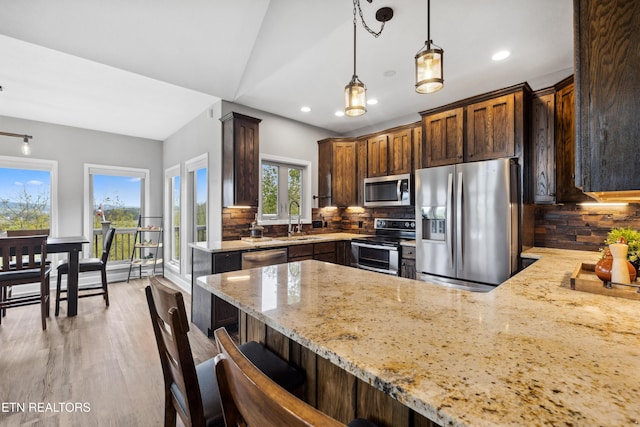 159 Garfield Ln, Sharps Chapel, TN 37866 - kitchen with stainless steel appliances, light stone countertops, a sink, a peninsula, and recessed lighting