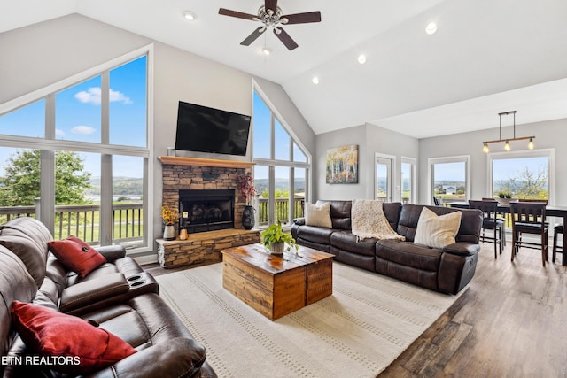 159 Garfield Ln, Sharps Chapel, TN 37866 - living area with light wood finished floors, high vaulted ceiling, a ceiling fan, recessed lighting, and a stone fireplace