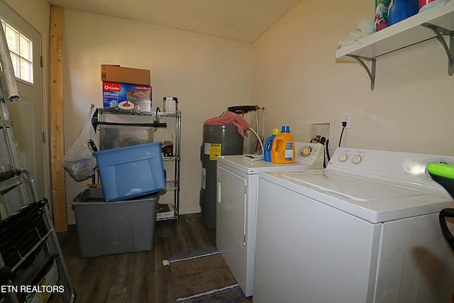 laundry room with washing machine and dryer, a textured ceiling, electric water heater, and dark hardwood / wood-style floors