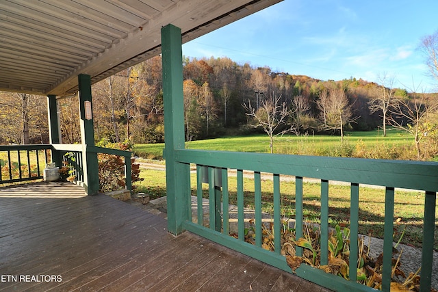 deck with central air condition unit and a yard