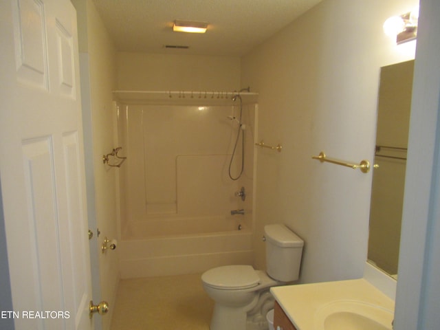 full bathroom with vanity, a textured ceiling, toilet, and shower / bathtub combination