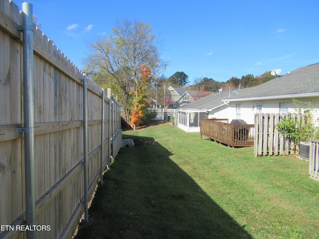 view of yard with a deck