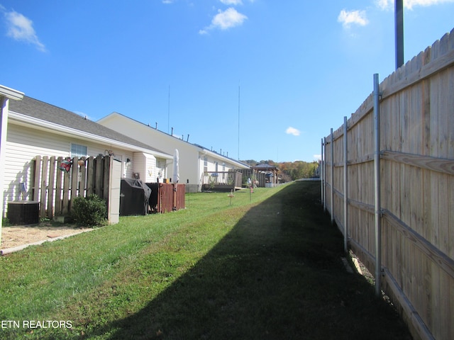 view of yard featuring central AC