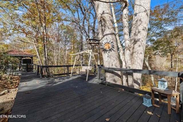 wooden deck featuring a gazebo