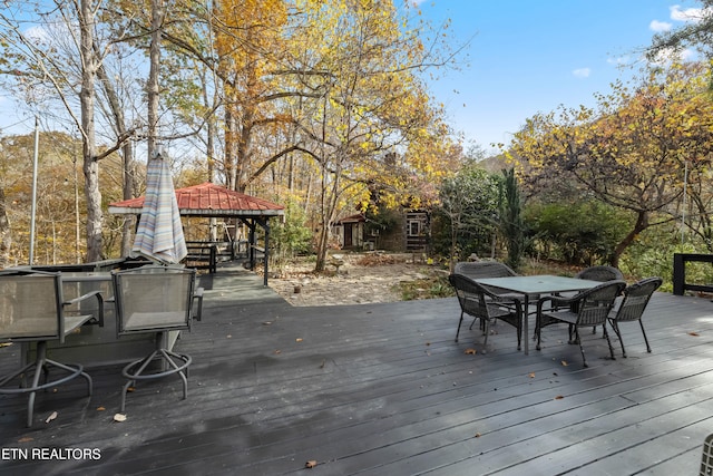 wooden deck with a gazebo