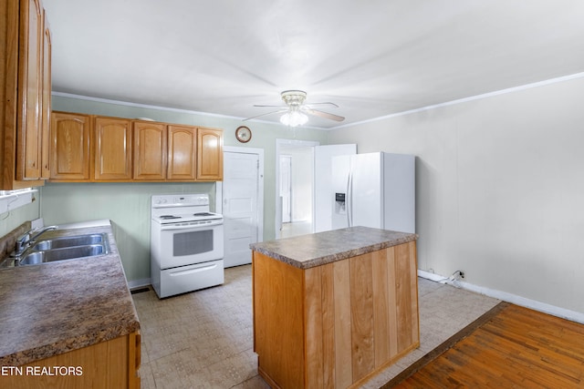 kitchen featuring crown molding, sink, white appliances, and ceiling fan