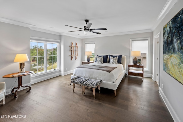 bedroom featuring dark wood-type flooring, ceiling fan, and ornamental molding