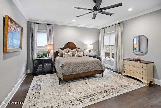 bedroom featuring ornamental molding, multiple windows, ceiling fan, and dark hardwood / wood-style floors