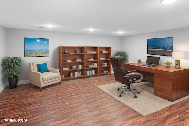 office space with dark wood-type flooring, visible vents, baseboards, and recessed lighting
