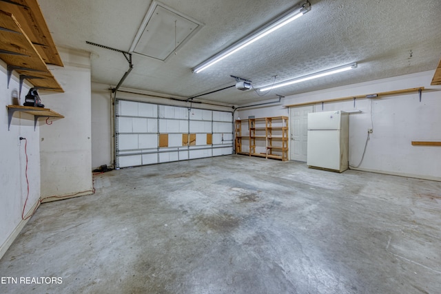 garage with white fridge