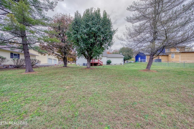 view of yard featuring a garage