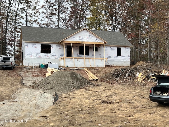 property in mid-construction featuring a porch