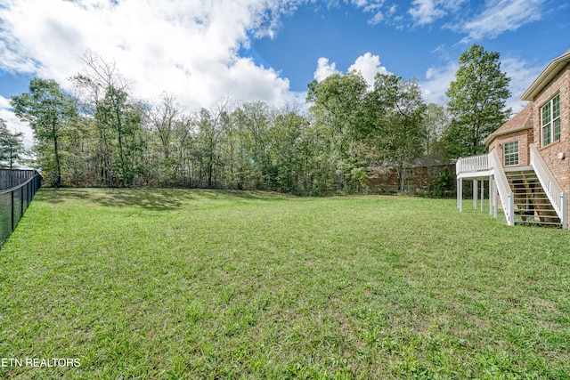 view of yard featuring a deck