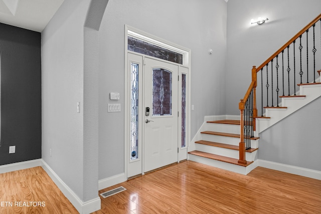 entrance foyer featuring hardwood / wood-style flooring