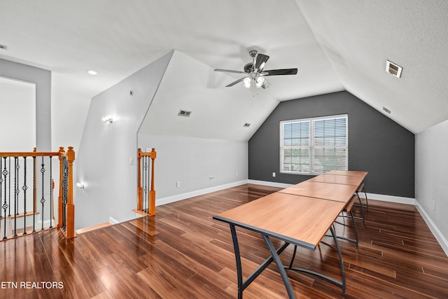 office area with baseboards, visible vents, wood finished floors, and a ceiling fan