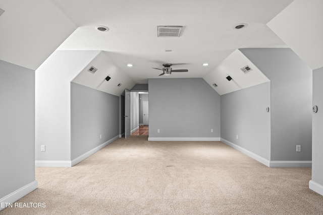 bonus room featuring light carpet, baseboards, and visible vents