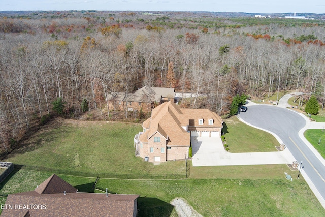 aerial view with a wooded view