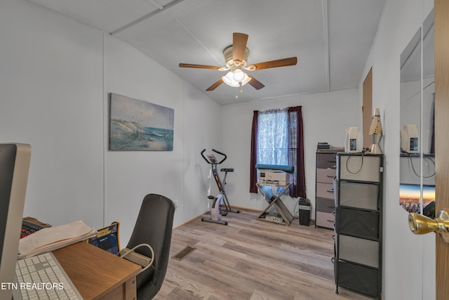 office with light hardwood / wood-style flooring, lofted ceiling, and ceiling fan