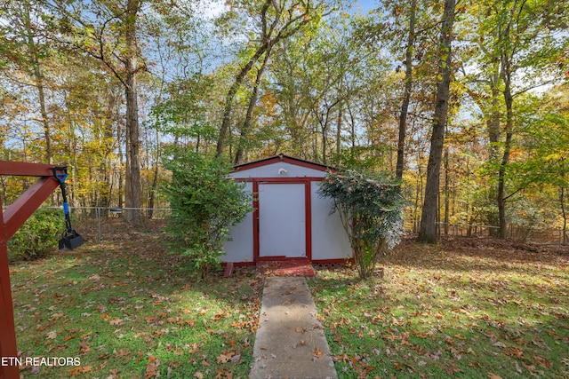 view of outdoor structure with a yard