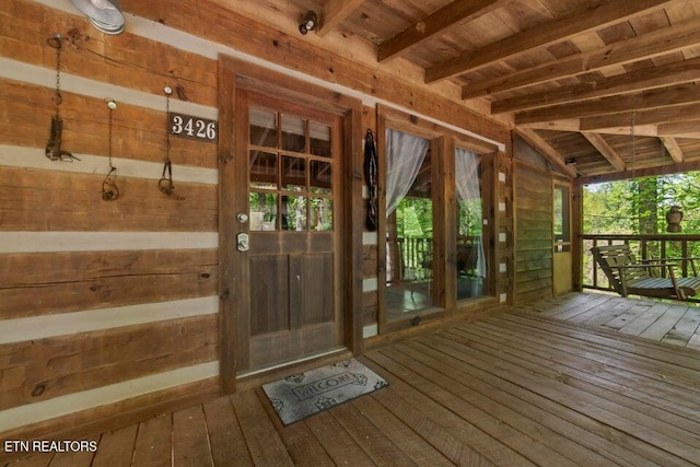 wooden deck featuring a porch