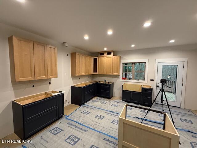 kitchen featuring light brown cabinetry