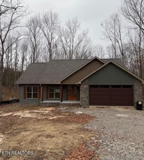 single story home with a garage