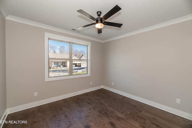 unfurnished room with ornamental molding, dark wood-type flooring, and ceiling fan