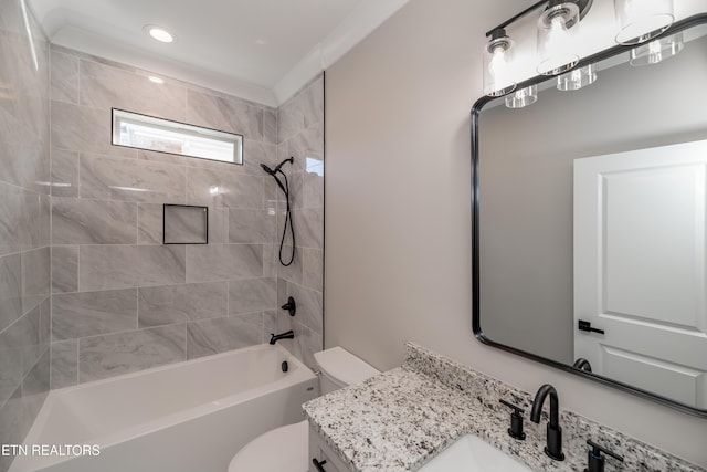 full bathroom with tiled shower / bath combo, vanity, and toilet