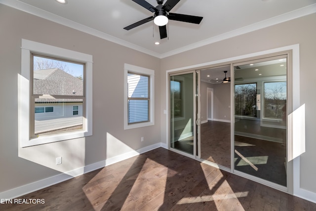 interior space featuring dark hardwood / wood-style floors and ornamental molding