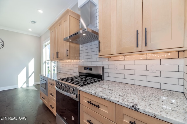 kitchen with stainless steel appliances, exhaust hood, ornamental molding, light stone counters, and light brown cabinetry