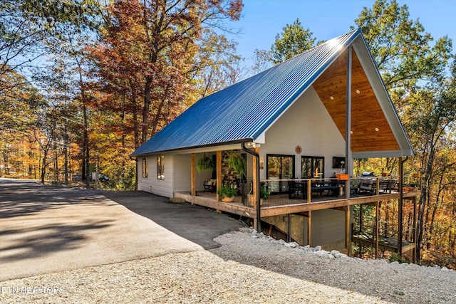 view of front of home with a wooden deck