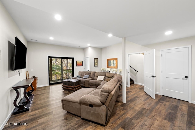 living room featuring dark hardwood / wood-style flooring