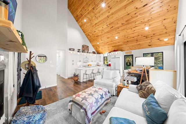 living room with dark hardwood / wood-style flooring, wood ceiling, and high vaulted ceiling