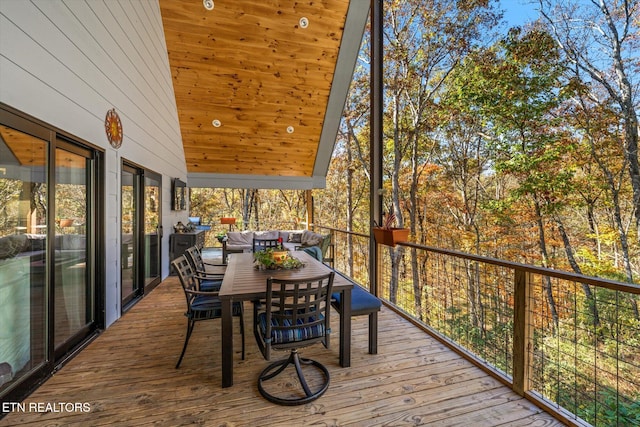 deck with an outdoor hangout area