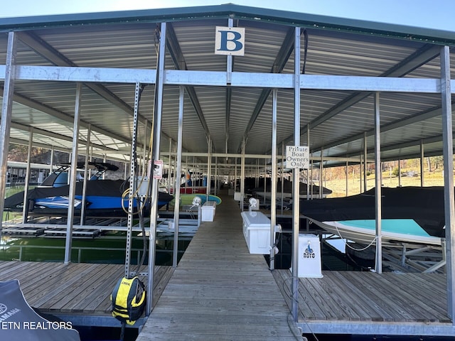 view of dock with a water view