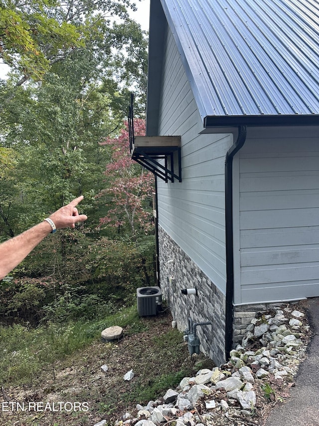 view of property exterior featuring cooling unit