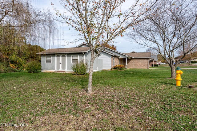 exterior space with a front lawn