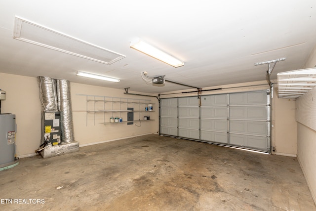 garage with a garage door opener and water heater