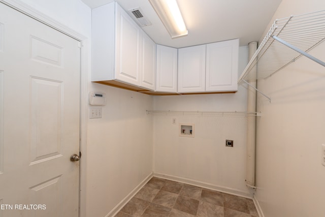 laundry room with washer hookup, cabinets, and electric dryer hookup