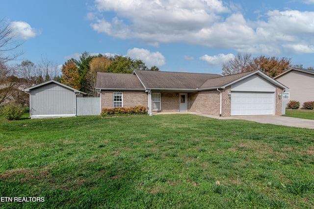 ranch-style house with a garage and a front lawn