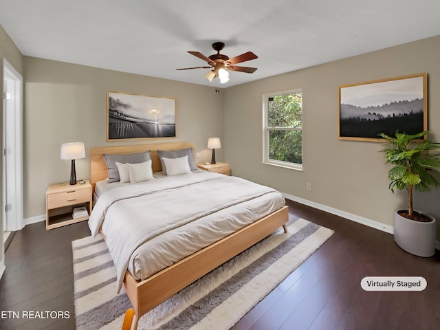 bedroom featuring ceiling fan and dark hardwood / wood-style flooring