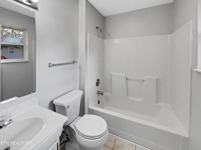 full bathroom featuring vanity, toilet, and  shower combination